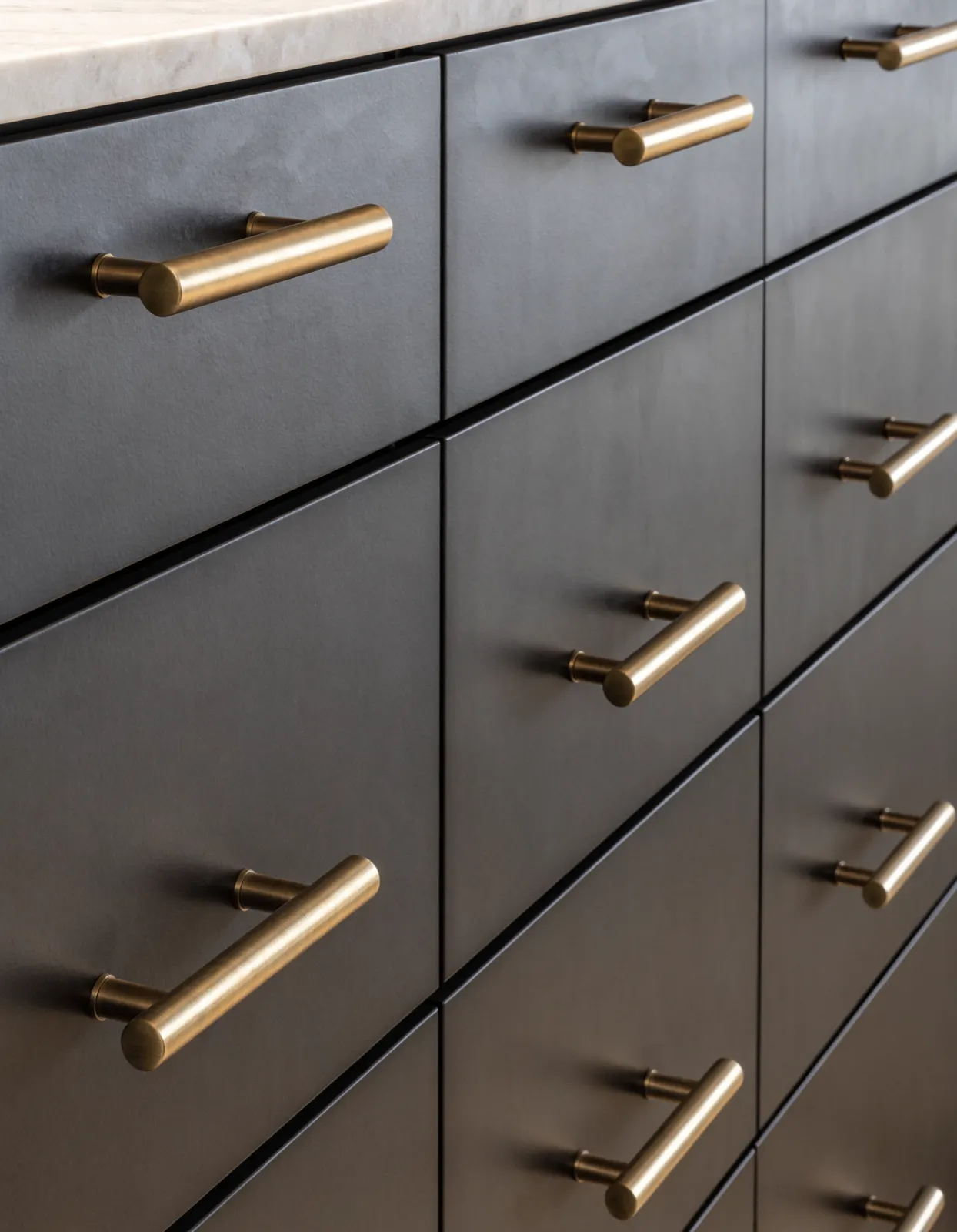 Cabinet hardware installation Davie, FL: a run of drawer fronts with matching bar pulls, every pull at the same height down the row