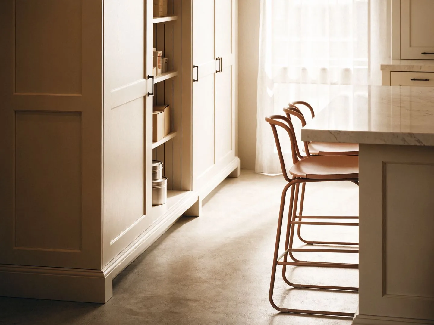 Cabinet maker in Davie, FL: a tall pantry cabinet and an island, two of the cabinet types on this page