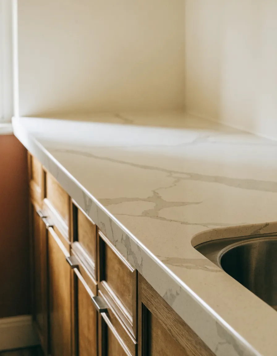 Countertop replacement Davie, FL: a new stone run set on the original cabinets, with the old laminate top already gone