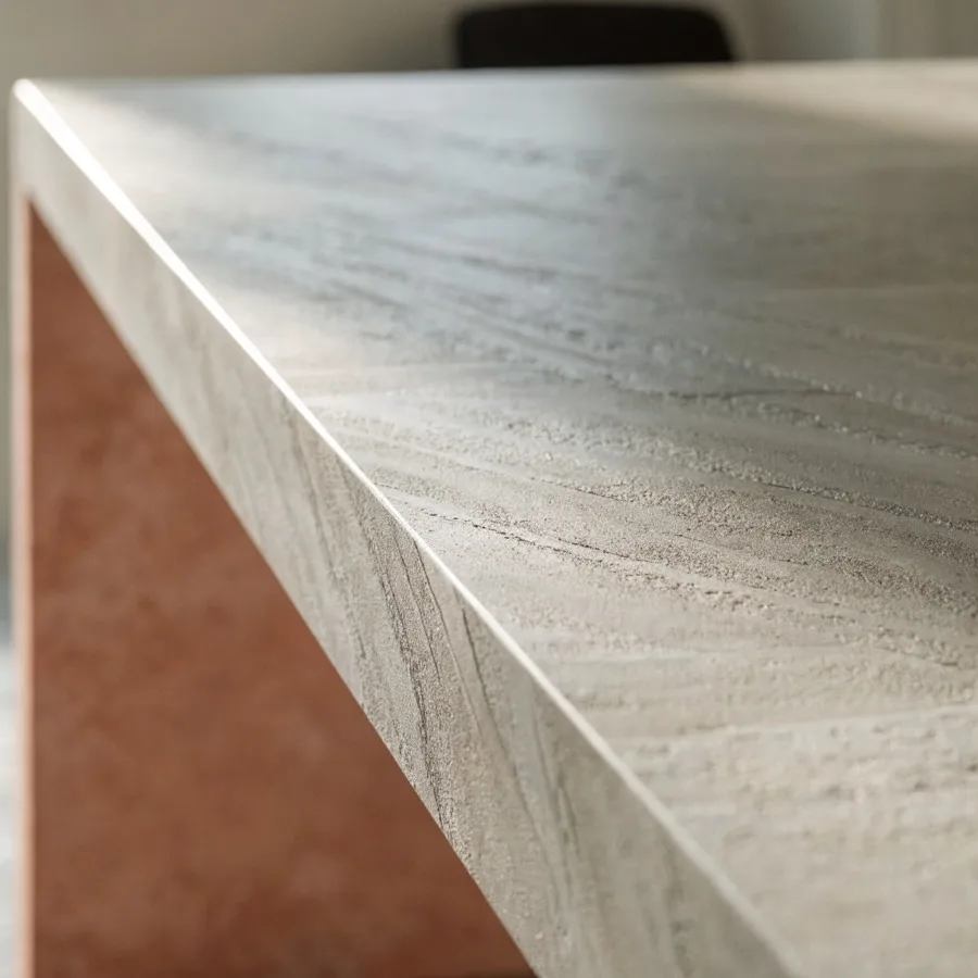 Textured quartz catching side light across the grain on a Davie island